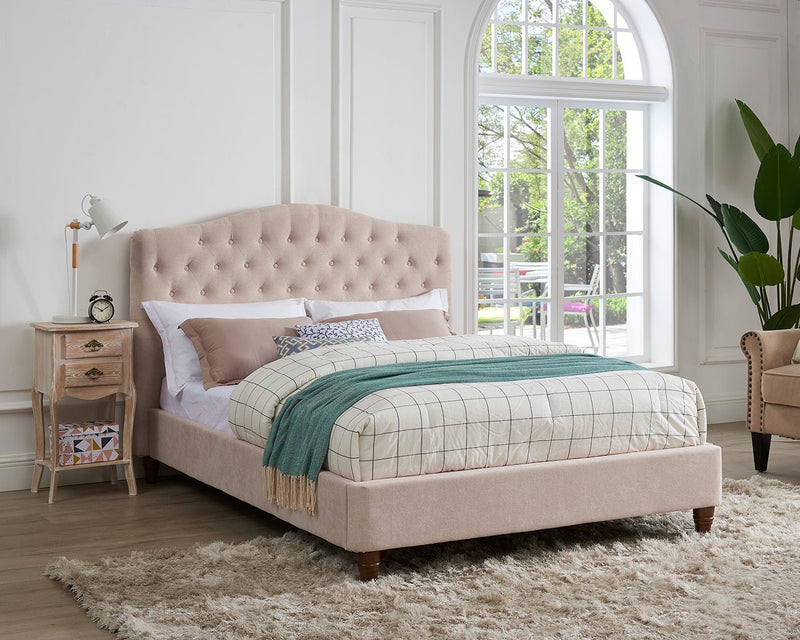 Pink upholstered king deals bed